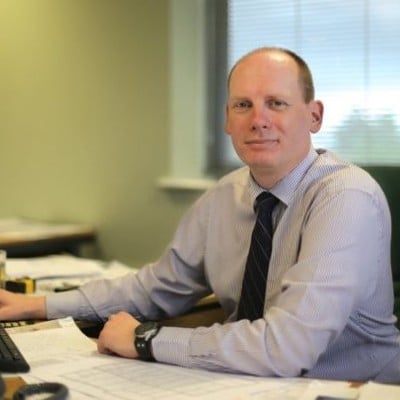 K. Hounslow, Director, Thomas Consulting
