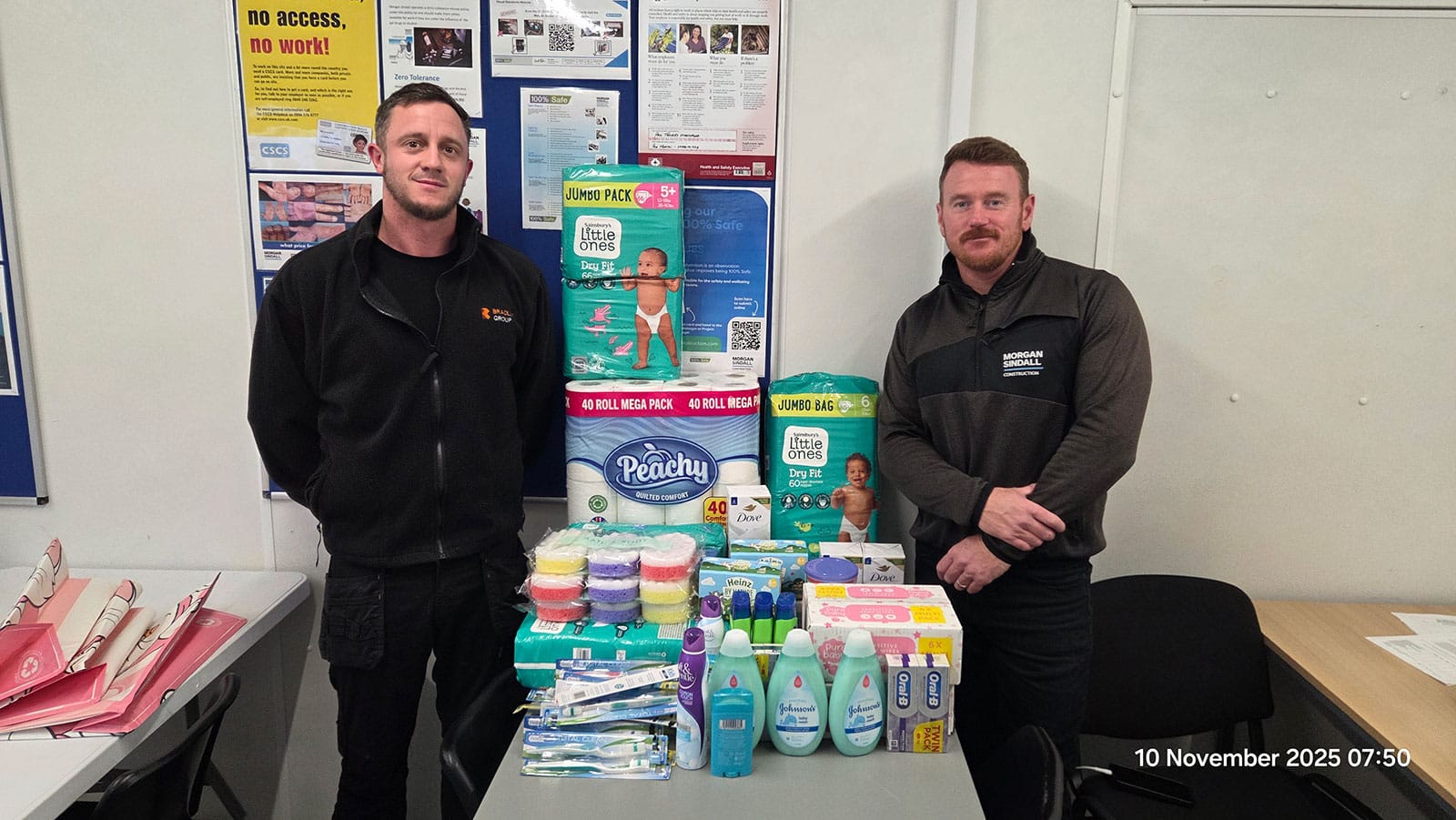 Bradley contributing donations to a Jamaican hurricane relief charity